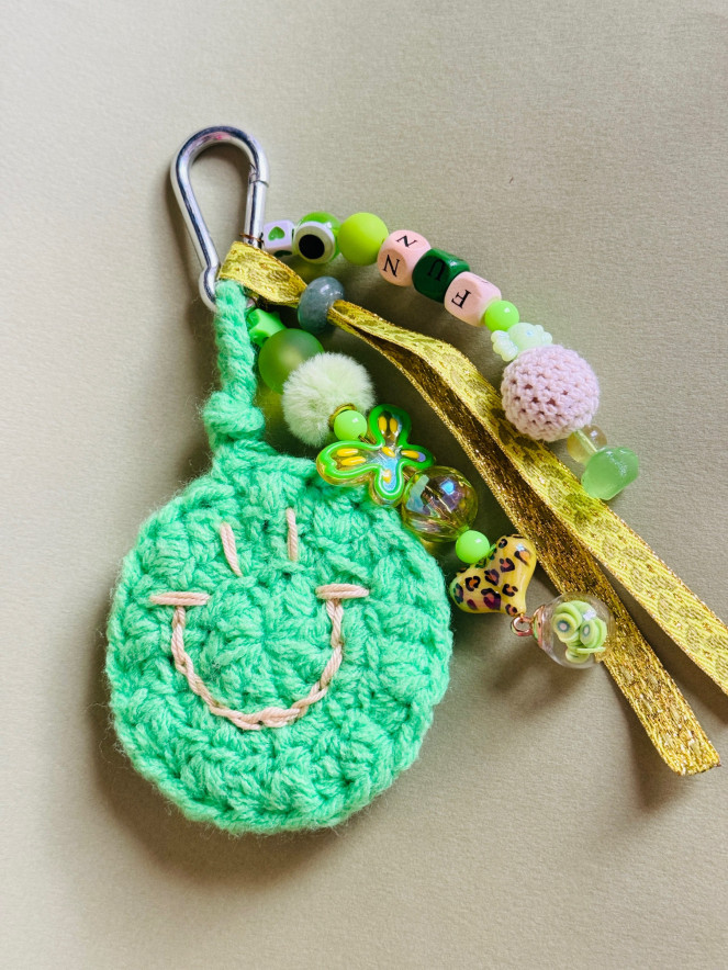 BIJOU DE SAC HYPNOCHIC SMILEY VERT